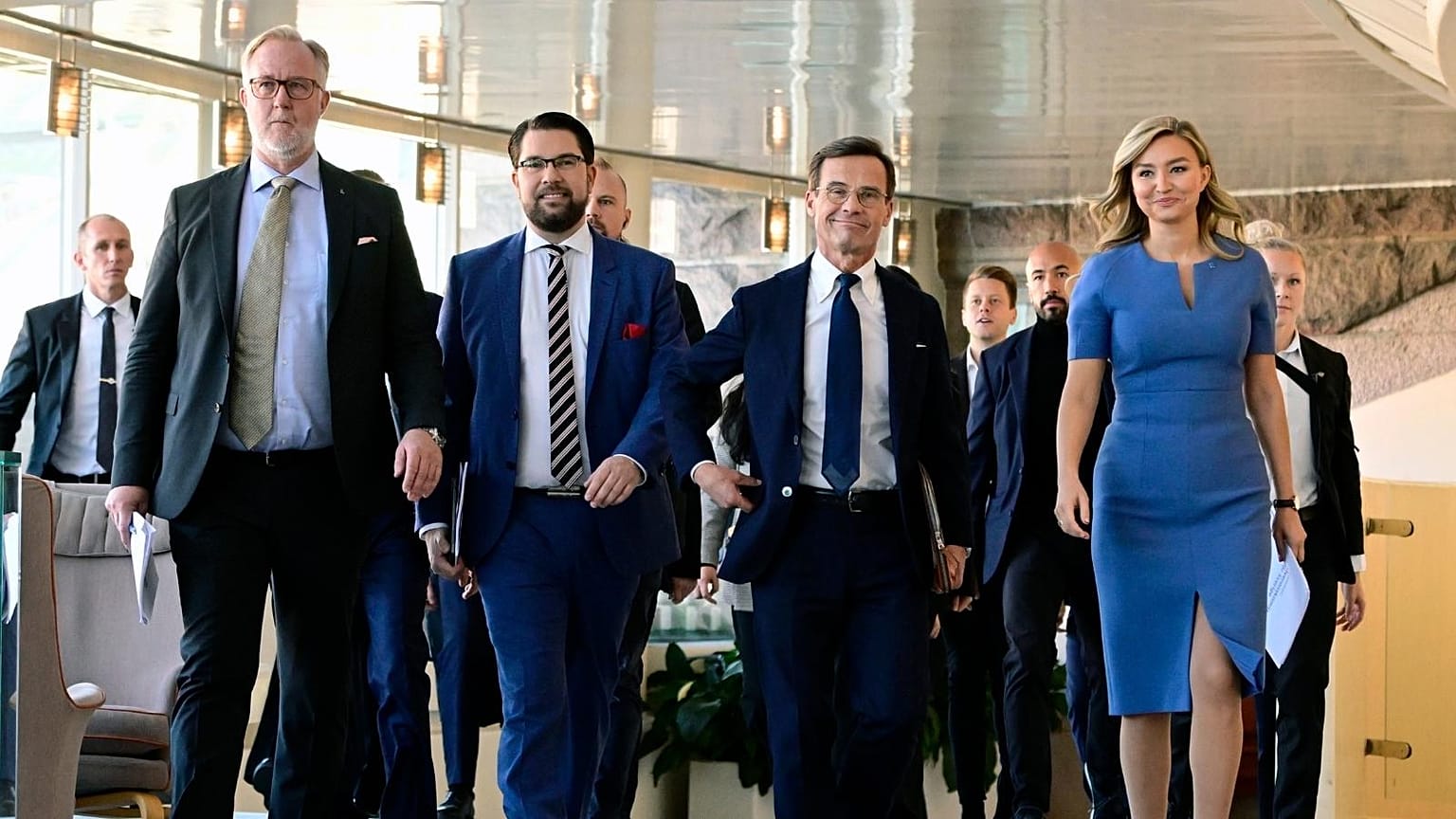 The leaders of four parties which will form the new government of Sweden, at the Parliament in Stockholm, Sweden, Friday Oct. 14, 2022.