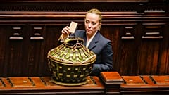 Brothers of Italy's leader Giorgia Meloni casts her ballot in the Italian lower Chamber on the opening session of the new parliament, 13 October 2022