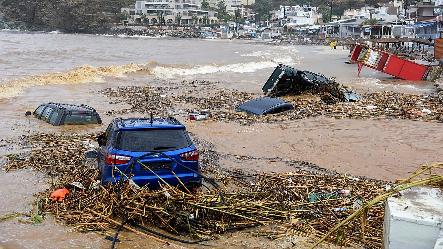 Cars submerged in water, following heavy thunderstorms, in the village of Agia Pelagia, on the island of Crete, 15 October 2022