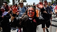 Revellers in costume take part in the traditional Zombie Parade celebrated ahead of Halloween, in Santiago.