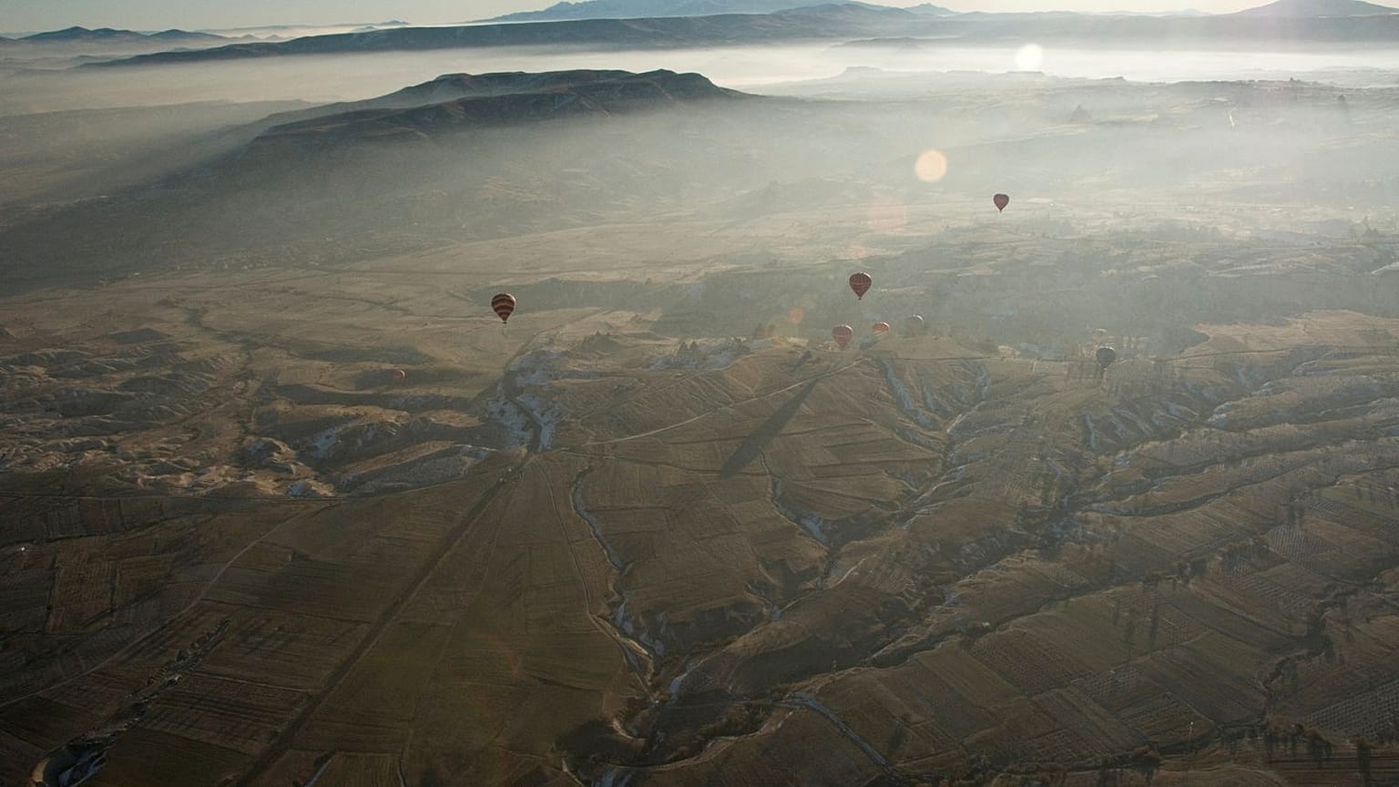 Cappadocia is a popular tourist destination in Turkey renowned for unusual rock formations and rock-caved churches.