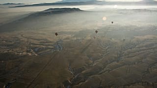 Cappadocia is a popular tourist destination in Turkey renowned for unusual rock formations and rock-caved churches.