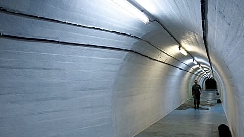 A  Bosnian Army soldier walks inside a nuclear bunker near the Bosnian town of Konjic, some 40 kilometers south of Sarajevo, on Friday, June 11, 2010. 