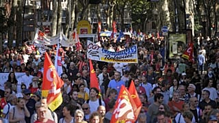 Protesters march during a demonstration in Toulouse, southwestern France, on October 18, 2022, after the CGT and FO trade unions called for higher wages