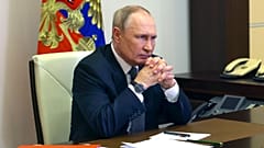Russian President Vladimir Putin chairs a Security Council meeting via videoconference at the Novo-Ogaryovo residence outside Moscow, Russia