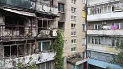 A building stands damaged by a missile in Irpin, near Kyiv, amid Russian aggression in Ukraine