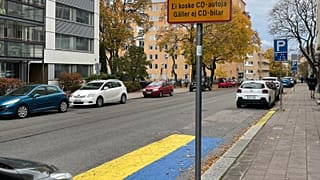 The colours of Ukraine's flag painted in the parking space outside home of Russian Consul General, Turku, Finland. October 2022