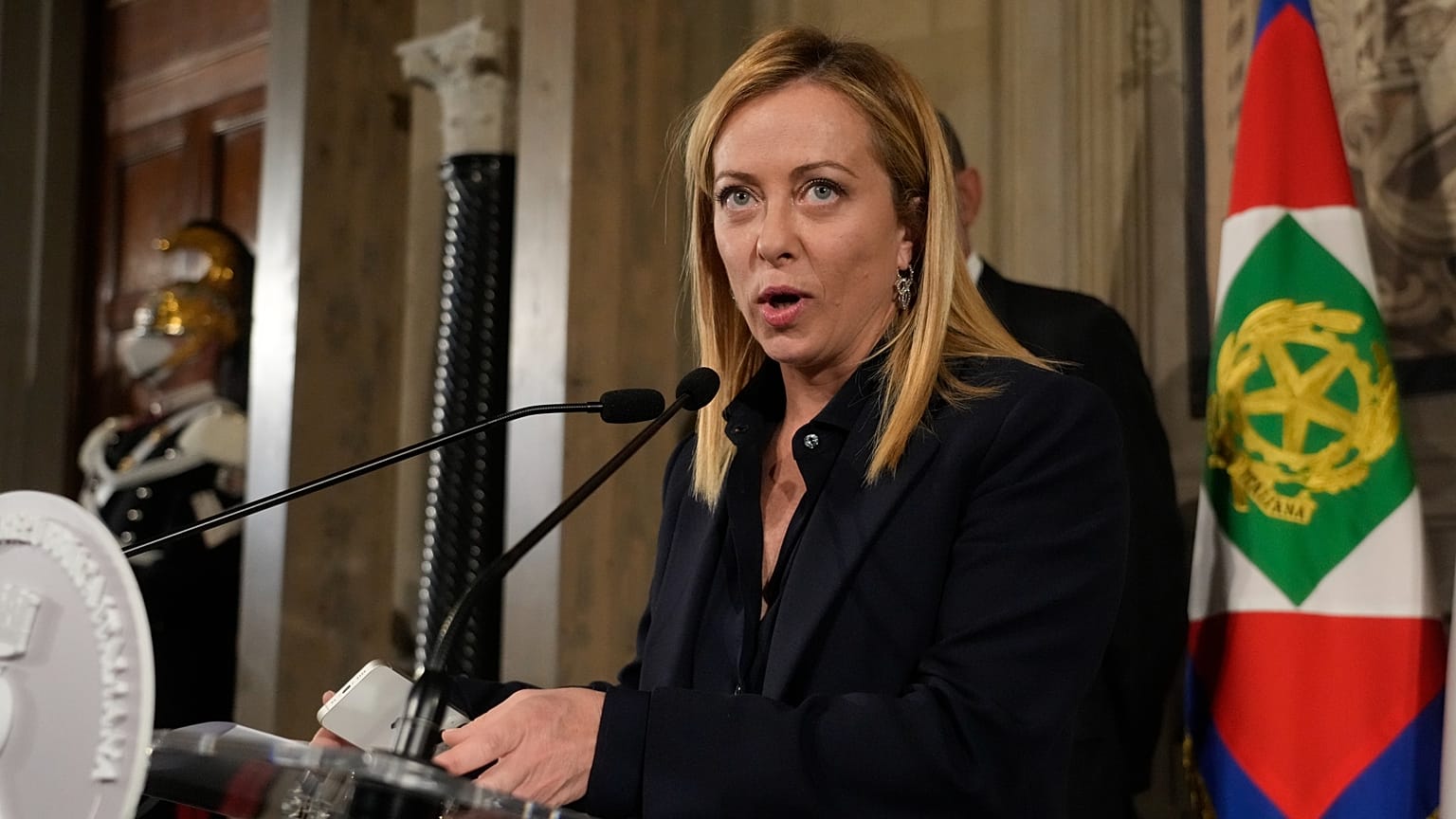 Brothers of Italy's leader Giorgia Meloni reads to the media the list of the ministers of Italy's new government after presenting it to Italian President Sergio Mattarella. 