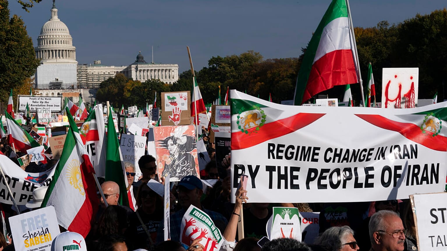 Demonstrators rally at the National Mall to protest against the Iranian regime, in Washington, Saturday, Oct. 22, 2022