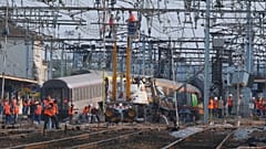 The intercity train derailed at a station, south of Paris, with 385 people on board.