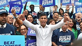 Rishi Sunak meets supporters as he arrives to attend a Conservative Party leadership election hustings in Birmingham, England. Tuesday, 23 August 2022.