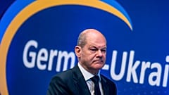 German Chancellor Olaf Scholz, walks to the lectern, at the German-Ukrainian Business Forum "Rebuild Ukraine", in Berlin, Monday, 24 October 2022.