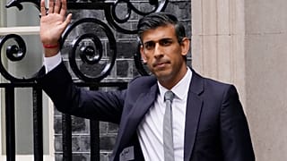 New British Prime Minister Rishi Sunak waves after arriving at Downing Street in London