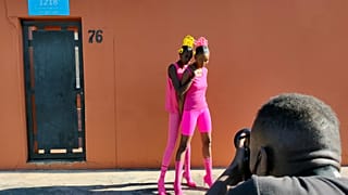 Jamal Nxedlana at work with models