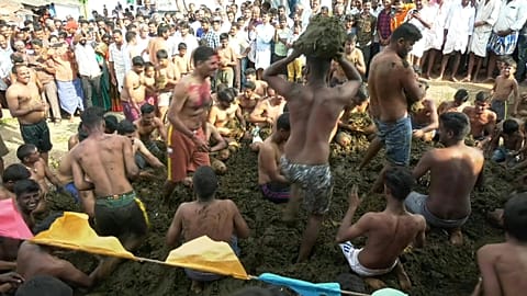"Our village deity is Beereshwara Swamy, and we have a strong religious belief that the lord is born in the cow dung," says Chetan Kumar as the town of Gummatapura celebrates 