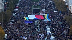Tens of thousands of people gathers for an anti-war protest in Prague, Czech Republic, Sunday, Oct. 30, 2022. 