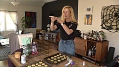 American librarian Rosie Grant filming cookies for her TikTok. 