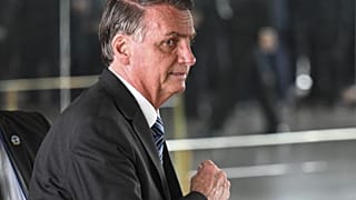 Bolsonaro leaves after making a statement for the first time since Sunday's presidential run-off election, at Alvorada Palace in Brasilia, on November 1, 2022.