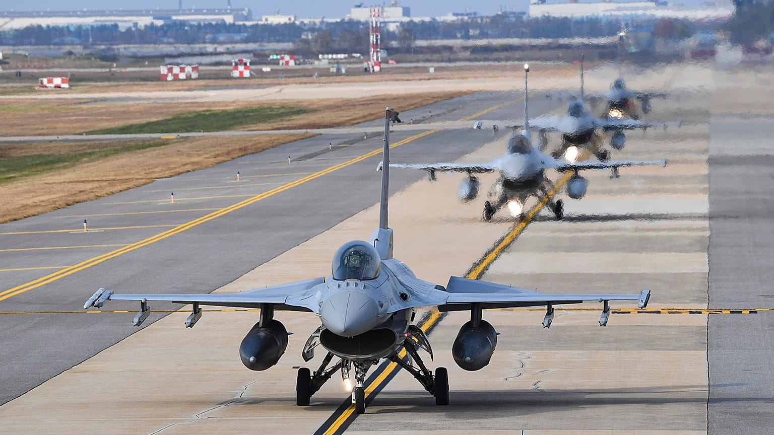 South Korean Air Forces' KF-16 fighters prepare to take off during joint aerial drills in Gunsan, South Korea, 31 October 2022