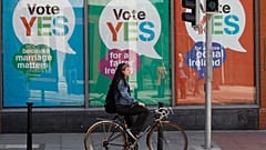 YES posters cover a shop's windows in Dublin, Ireland, May 21, 2015, before a referendum that resulted in the legalisation of same-sex marriage. 