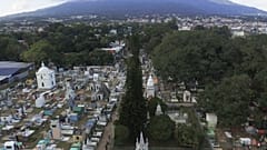 General view of the Nueva San Salvador Cemetery, with the San Salvador volcano in the background, during the Day of the Dead celebrations in Santa Tecla, El Salvador, Wednesda