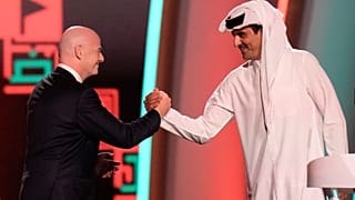 FIFA President Gianni Infantino, left, and Emir of Qatar Sheikh Tamim bin Hamad Al Thani shake hands before the World Cup draw, Doha, Qatar, Friday, April 1, 2022.