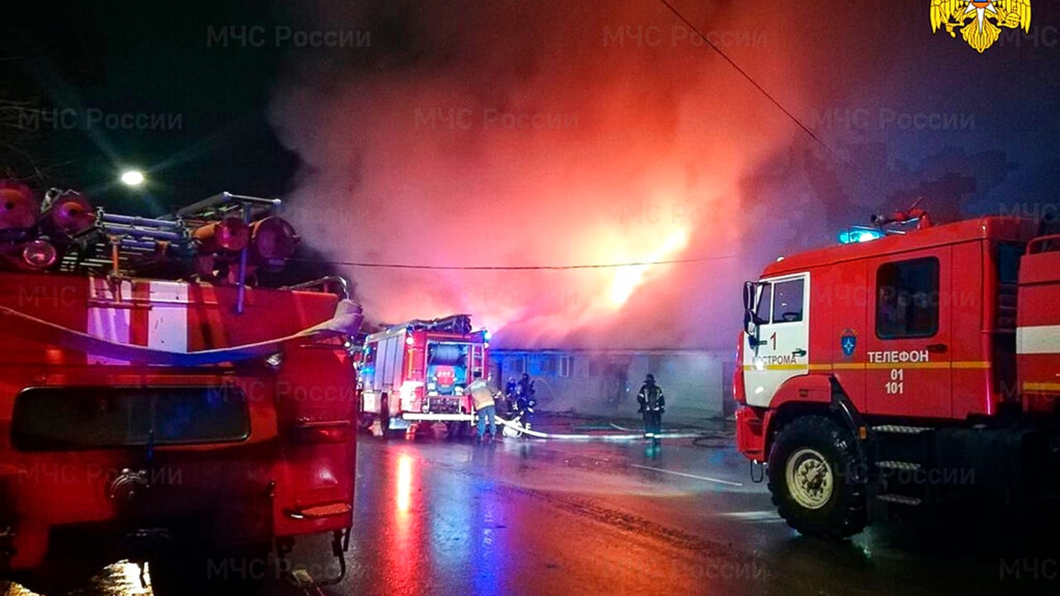 Firefighters try to extinguish a fire at a cafe in Kostroma, Russia, Saturday, Nov. 5, 2022. 