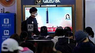 A TV screen shows a file image of North Korea's missile launch during a news program at the Seoul Railway Station in Seoul, South Korea.