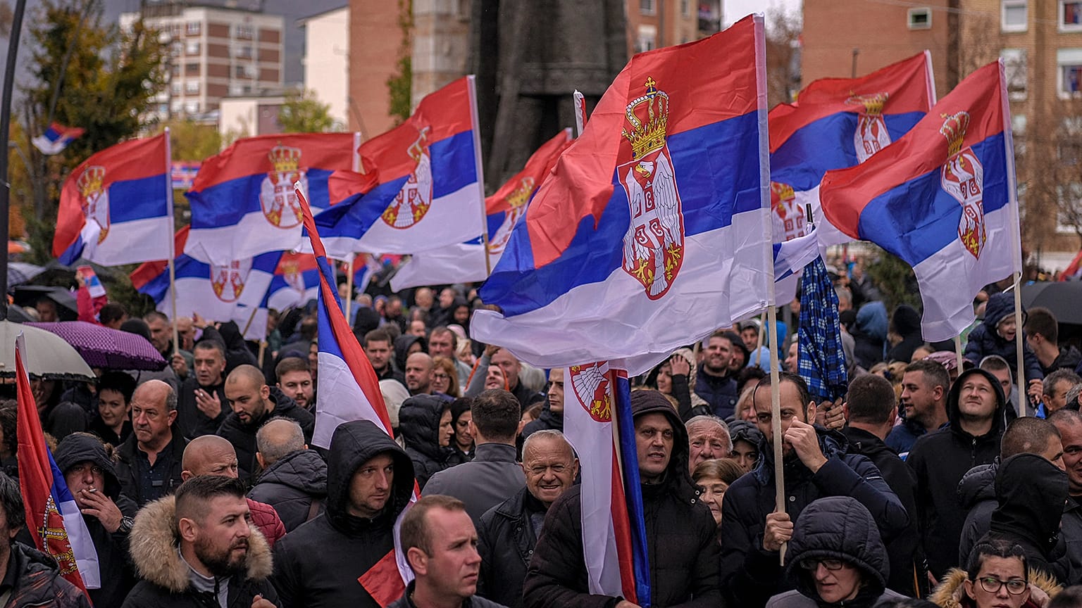 Kosovo Serbs wave Serbian flags during a protest in the Serb-majority municipality of North Mitrovica, 6 November 2022