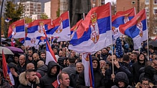 Kosovo Serbs wave Serbian flags during a protest in the Serb-majority municipality of North Mitrovica, 6 November 2022
