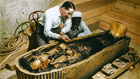 Howard Carter examine King Tut's sarcophagus, colourisation by Dynamichrome
