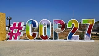 Signage promoting the COP27 U.N. Climate Summit is displayed in the Green Zone, in Sharm el-Sheikh, Egypt, Monday, Nov. 7, 2022.