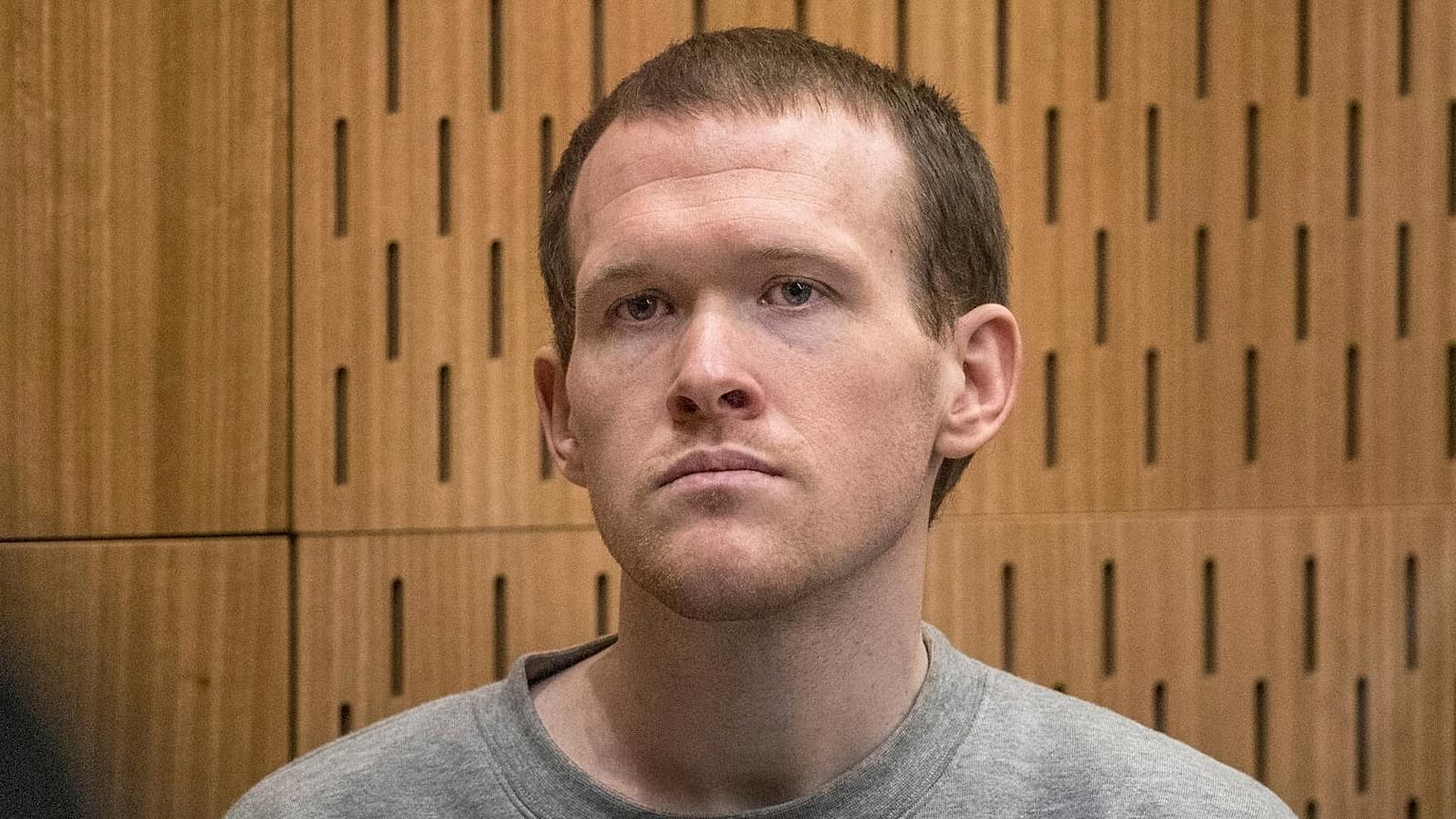 FILE - Australian Brenton Harrison Tarrant, 29, sits in the dock at the Christchurch High Court, New Zealand, Aug. 27, 2020. 