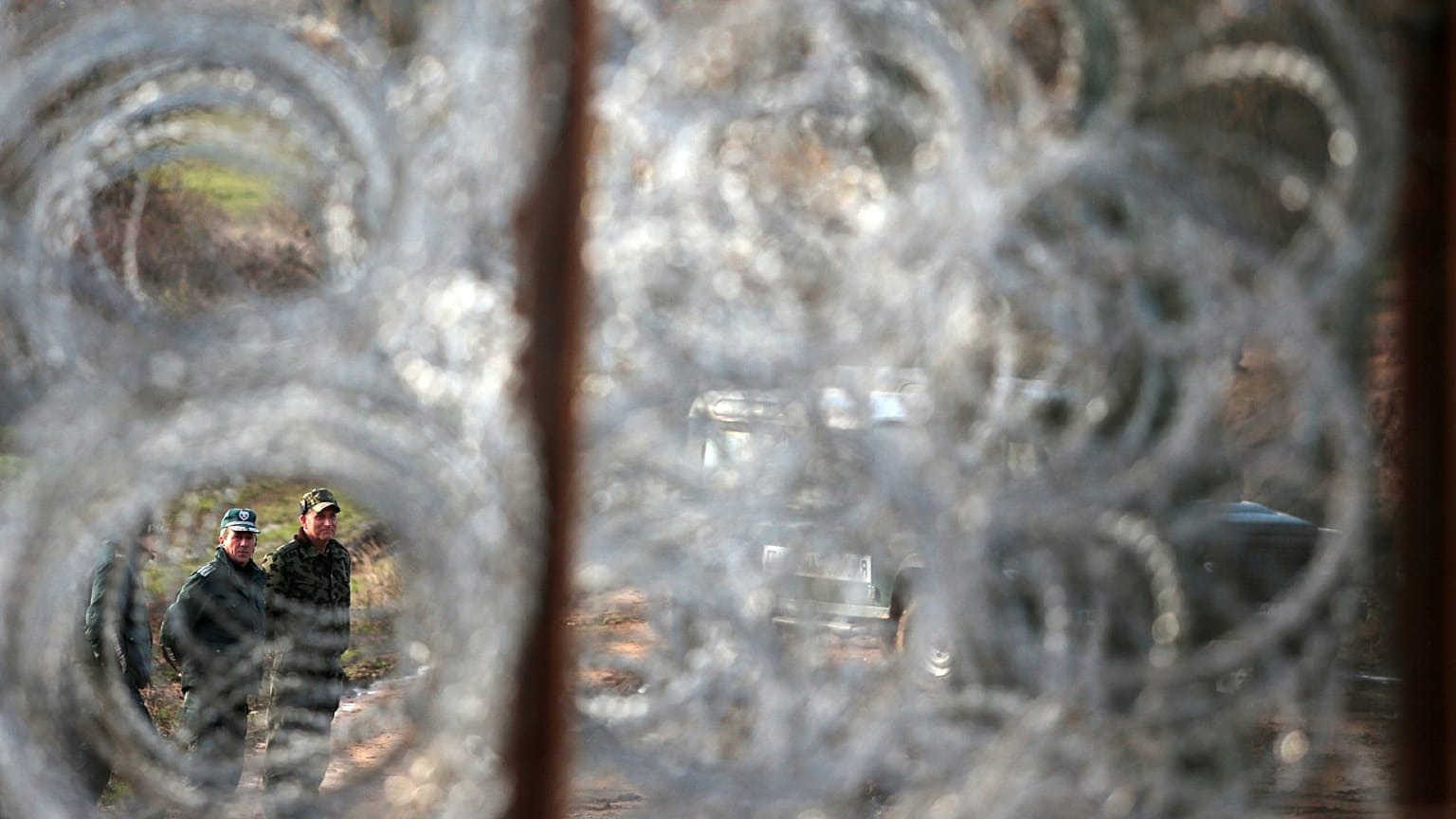Border policemen stand guard at the Bulgarian-Turkish border near the village of Golyam Dervent in 2013