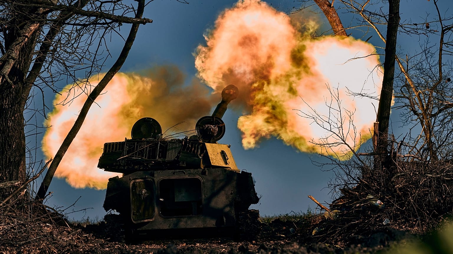 A self-propelled artillery vehicle fires near Bakhmut, Donetsk region, Ukraine, Wednesday, Nov. 9, 2022. 