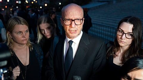 Film director Paul Haggis leaves court after losing sexual assault civil lawsuit