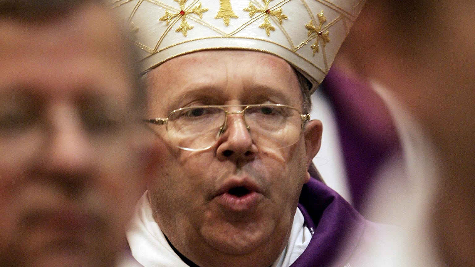 Monsignor Jean-Pierre Ricard, Archbishop of Bordeaux, France, celebrates a Mass in St.Louis of French church in Rome in March 2006