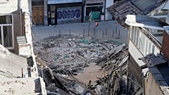 French police blocks access to the site of a collapsed building in the city of Lille, northern France, on November 12, 2022