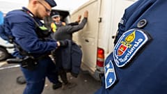 The suspected people smugglers fired shots at Hungarian police from a van carrying migrants on Monday.