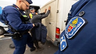 The suspected people smugglers fired shots at Hungarian police from a van carrying migrants on Monday.