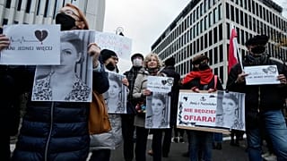 Protestors gather outside Poland's Constitutional Tribunal in Warsaw, Poland, on Saturday, Nov.6, 2021