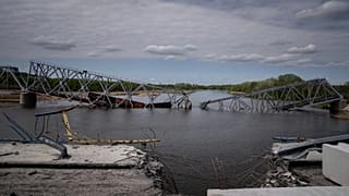 A view of a destroyed railway bridge over Siverskiy Donets river near Raigorodka, Donetsk region, eastern Ukraine, on April 30, 2022.