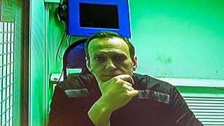 Alexei Navalny is seen in a video link provided by the Russian Federal Penitentiary Service in a courtroom  in Moscow, Russia, Tuesday, Oct. 18, 2022.
