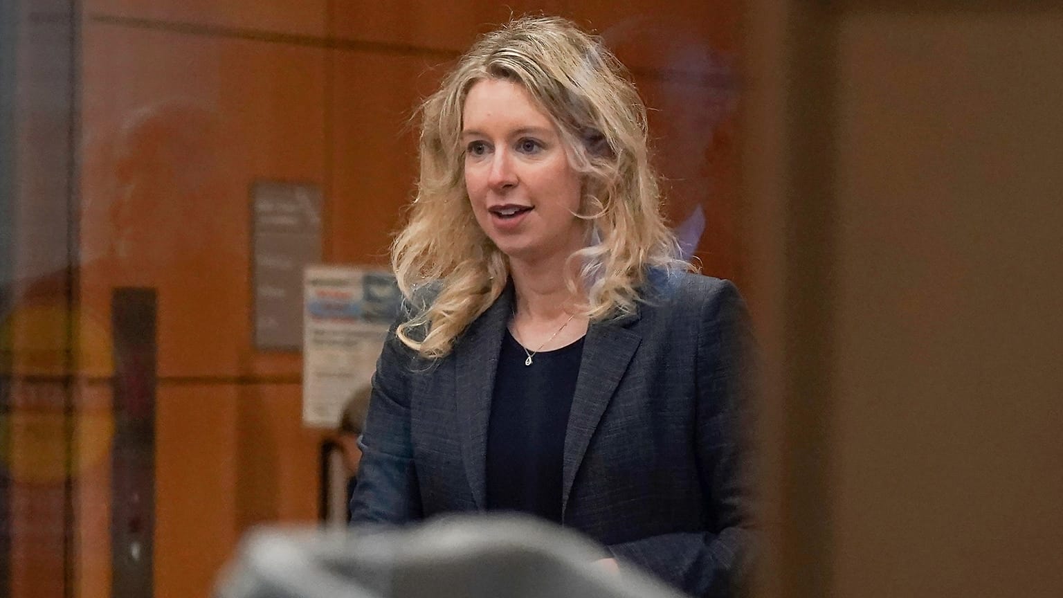 FILE - Former Theranos CEO Elizabeth Holmes arrives at federal court in San Jose, Calif., on Oct. 17, 2022. 