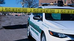 A Colorado Springs Community Service vehicle is parked near a gay nightclub in Colorado Springs, Colo., Sunday, Nov. 20, 2022 where a shooting occurred late Saturday night.