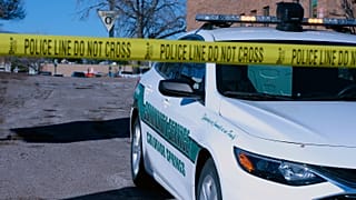 A Colorado Springs Community Service vehicle is parked near a gay nightclub in Colorado Springs, Colo., Sunday, Nov. 20, 2022 where a shooting occurred late Saturday night.