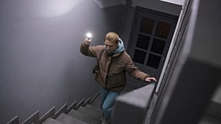 Anastasia Pyrozhenko, 25, climbs the stairs in her multi-storey apartment building in Kyiv, 20 November 2022