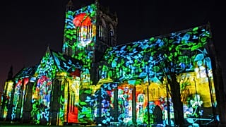 Paisley Abbey lit up for an installation called 'About Us', created by 59 Productions, as part of the UNBOXED: Creativity in the UK event, in Paisley, Scotland, Feb. 28, 2022.