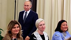 Russian President Vladimir Putin arrives to meet with mothers of military personnel serving in the war, 25 November 2022
