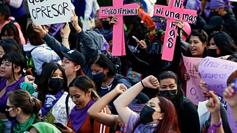 Demonstrators march to commemorate the International Day for the Elimination of Violence Against Women in Mexico City. 